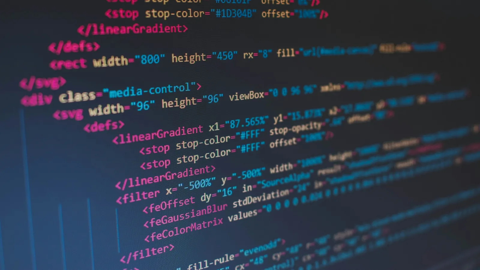 Lines of colourful code on a dark screen